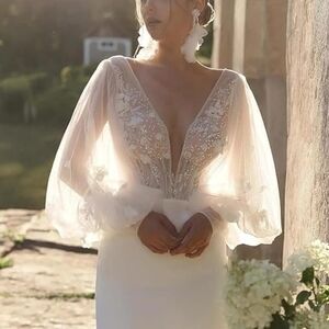 White Plunge Neck Bishop Sleeve Wedding Gown